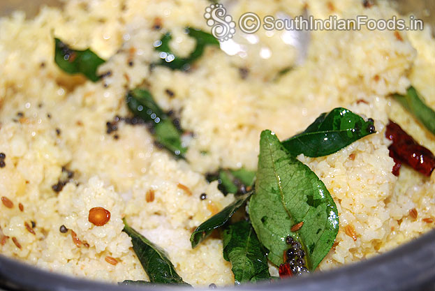 Add seasoned ingredients to the pani varagu dal mixture mix well