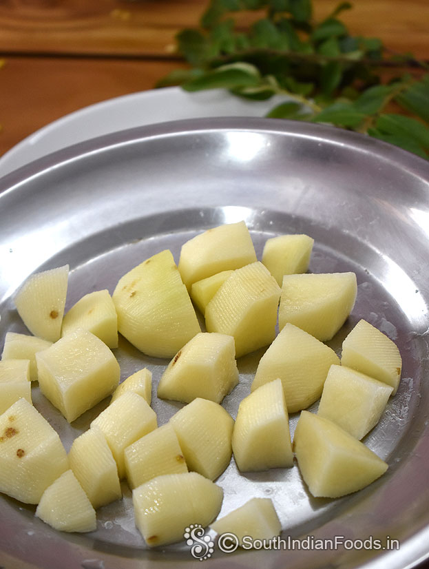 Peel off, wash & cube potato