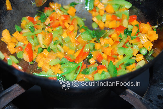 In the same pan add ginger, green chilli, curry leaves, carrot, capsicum saute for a min