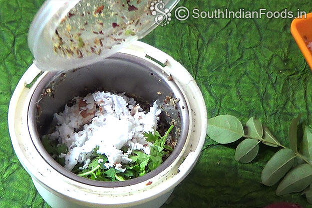 Add coconut, coriander leaves coarsely grind, keep it aside