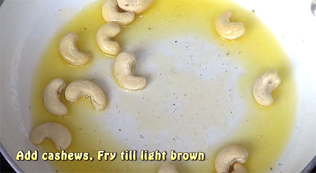 Add cashews, fry till light brown