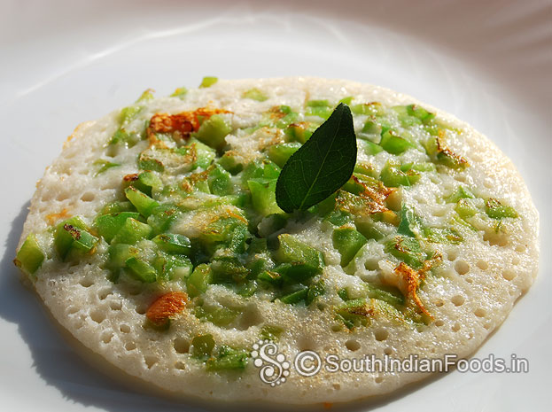 Capsicum uthappam is ready, serve hot with coconut chutney