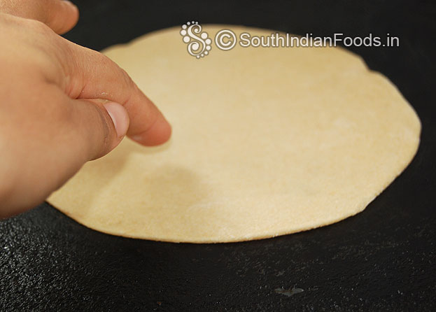 Heat iron dosa tawa place raw chapati