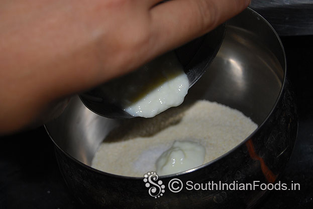 Add curd mix well for oats paddu