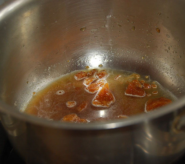 Heat pan add jaggery & water dissolve