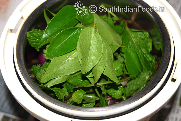 Add curry leaves, coriander leaves, & mint leaves coarsely grind