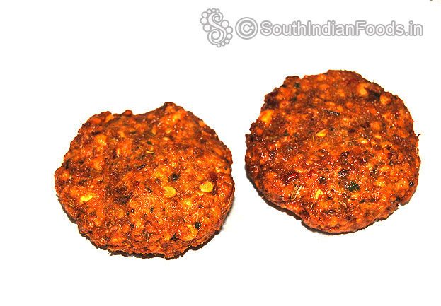 Drain fried vadas on absorbent paper
