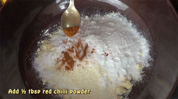 Add red chilli powder [milagai podi]