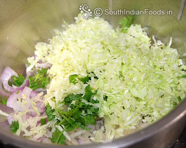 Add green chilli, ginger, garlic, and grated cabbage