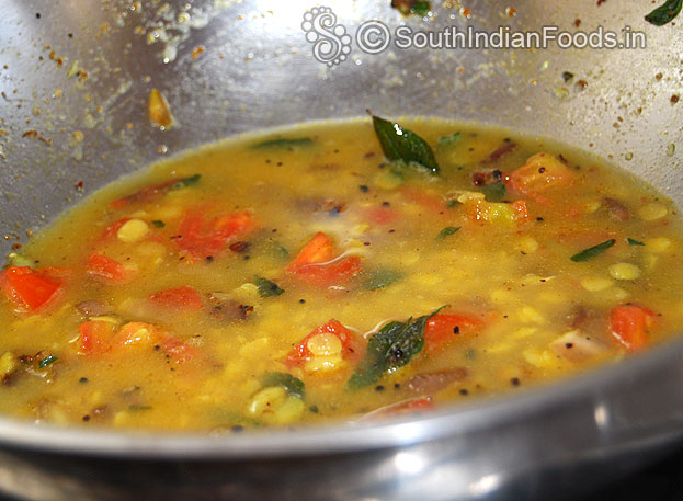 Add boiled toor dal add water if required