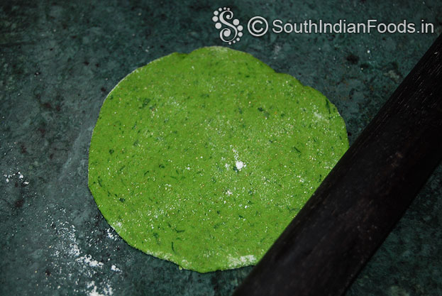 Roll over and make round shape palak poori