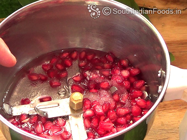 Add pomegranate, sugar, & water in a mixer jar & finely grind