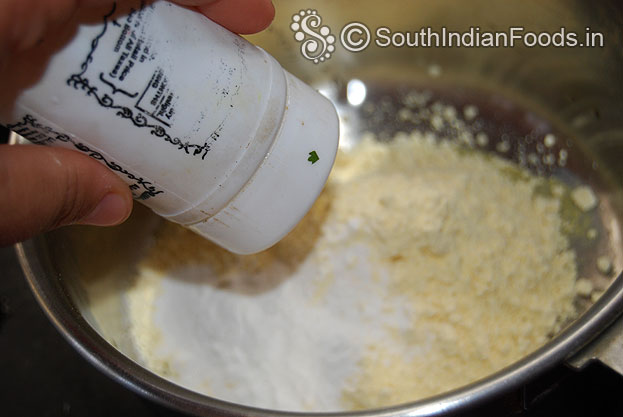 Add gram flour, rice flour, asafetida & salt mix well