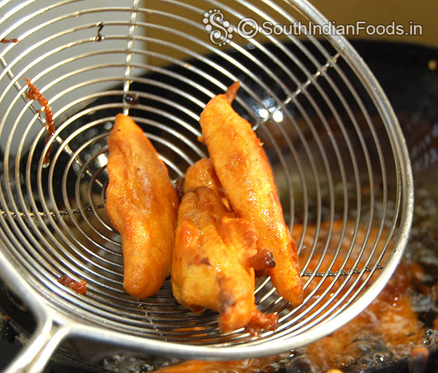 Potato pakora wedges are ready remove from oil