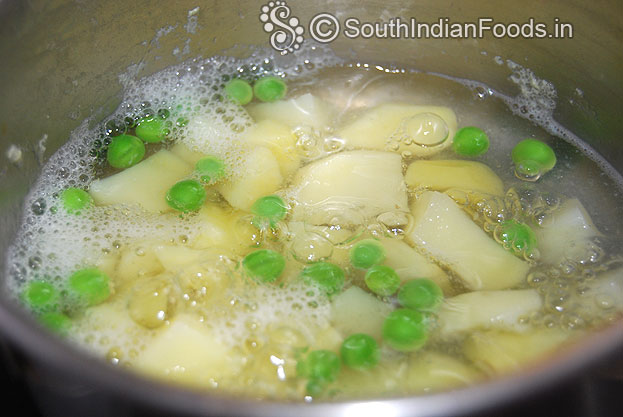 Boil potato and green peas