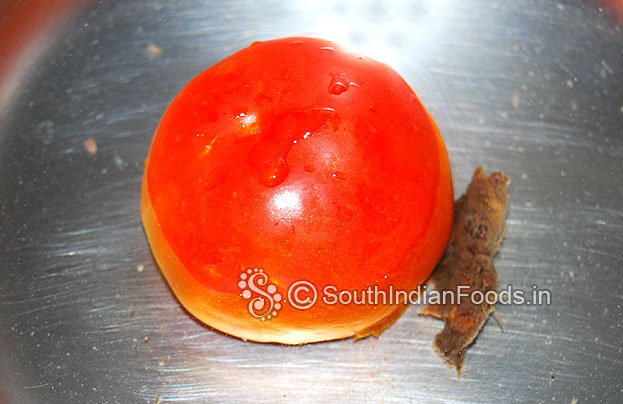 Wash & soak tomato tamarind in warm water