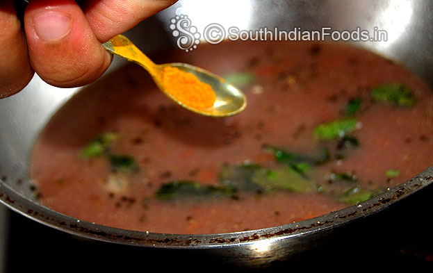 Add turmeric powder to the rajma rasam