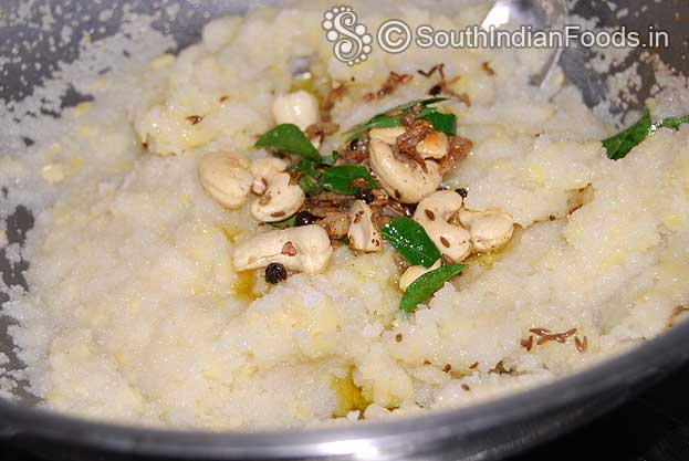 Add seasoned ingredients and ghee to the rava mixture mix well