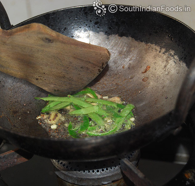 Add ginger, green chilli & curry leaves