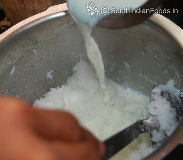 Add milk to mashed rice