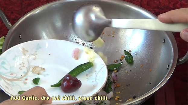 Add garlic, dry red chilli & green chilli
