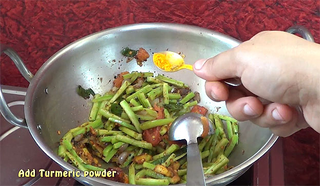 Add turmeric powder saute for 3 min or saute till raw smell out from snake gourd
