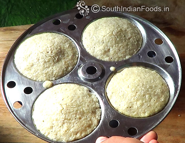 Using sharp spoon, remove idli from idli plates