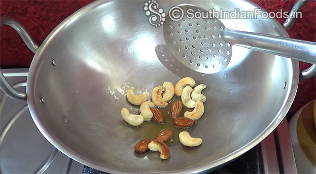 Roasted cashews, almonds ready, transfer to a plate, finely chop