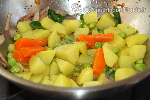 Add boiled vegetables & Green toor dal