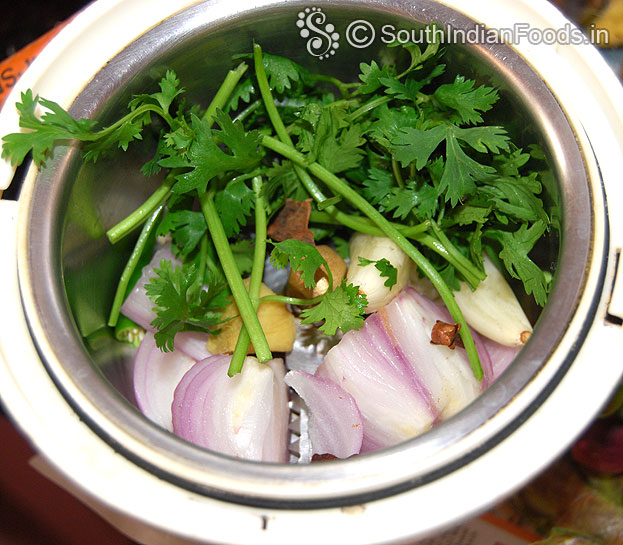 Add onion, ginger, garlic, coriander leaves, cloves, cinnamon in mixie jar coarsely grind