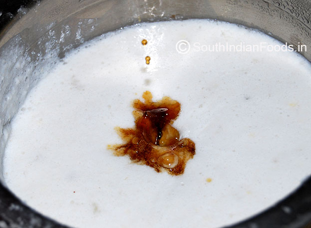 pour melted palm sugar into dosa batter