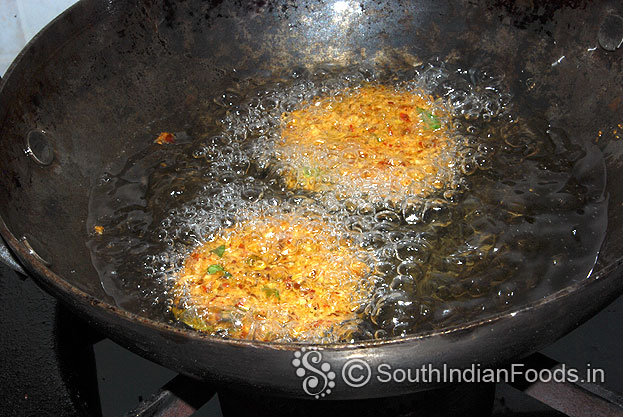 Now vadas are ready take it out from oil & drain on an absorbent paper serve hot.