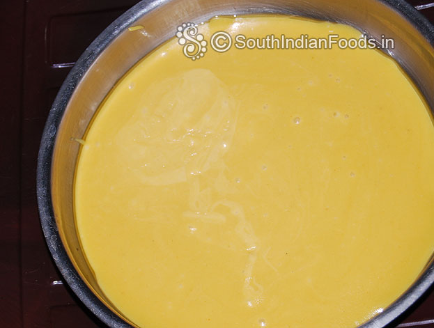 Immediately transfer the mixture to the ghee greased tray leave it for 10 min.