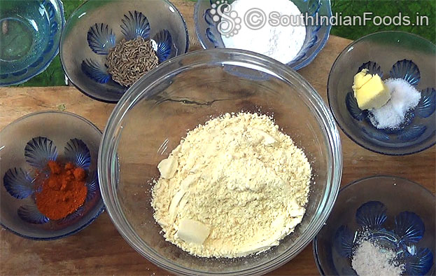 In a bowl add ground pottukadalai powder
