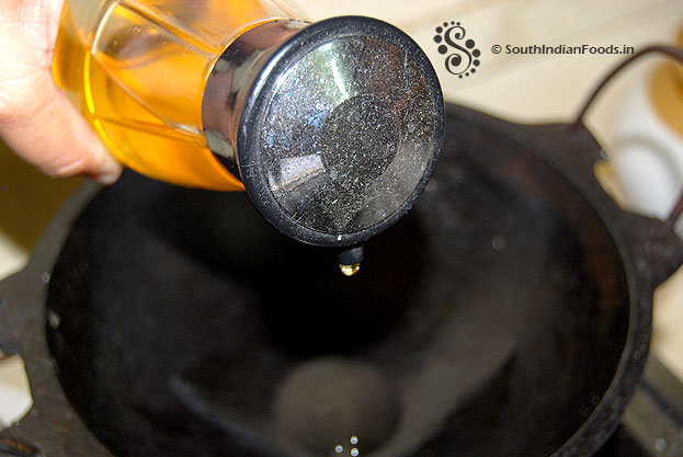 Pour gingelly oil in a thick pan