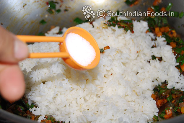 Add boiled rice salt mix well