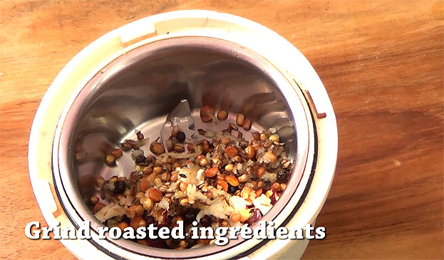 Put roasted ingredients in a mixie jar, coarsely grind