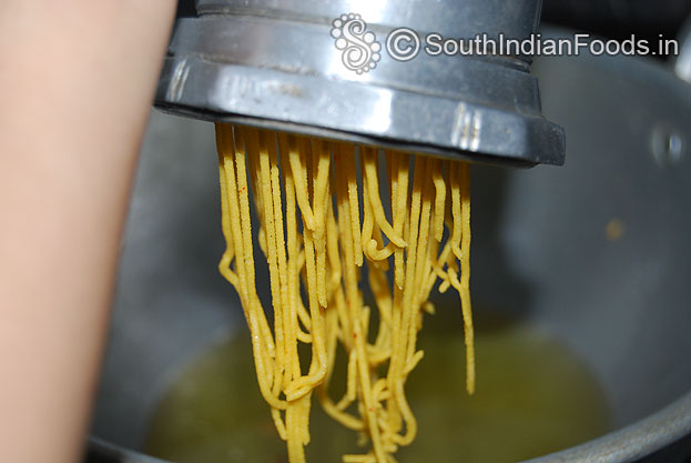 Heat oil in a pan, squeeze over the oil and deep fry till crispy