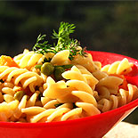 Masala fusilli pasta with carrots green peas