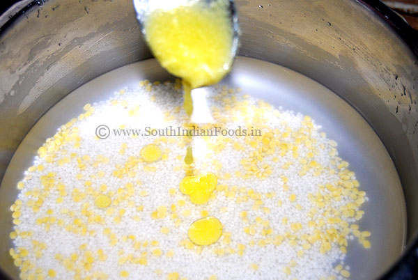 Adding ghee in varagu rice mixture