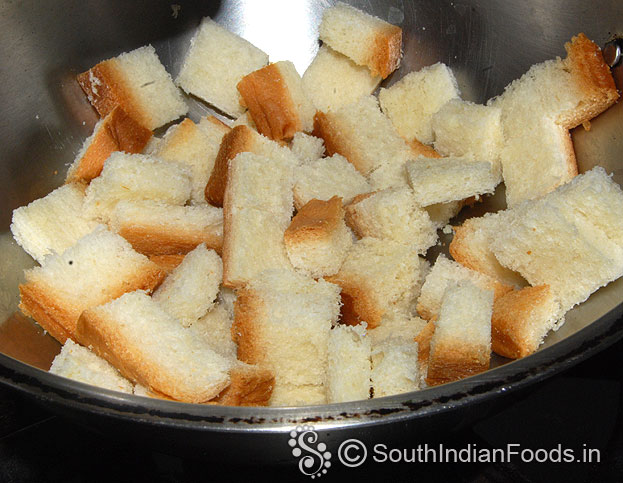 Heat pan, add bread cubes, roast till crisp