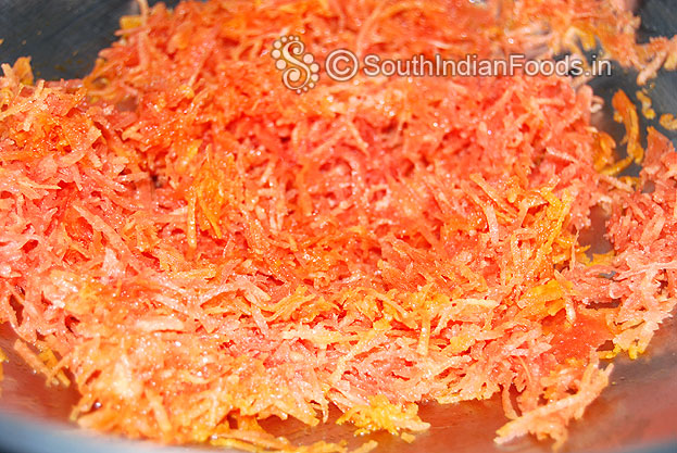 In the same pan add finely grated carrot saute