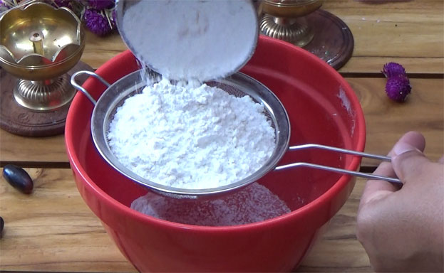 In a bowl add 1.5 cup flour, seive without lumps