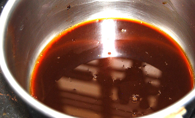 Add coffee powder, cocoa powder, sugar, warm water mix well , let it cool