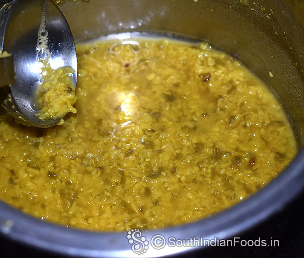 Boil roasted moong dal with turmeric & red chilli powder till soft