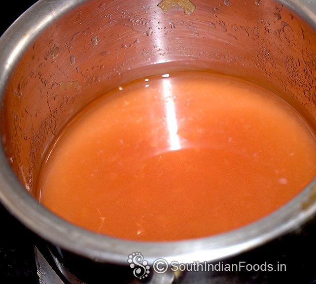 Add tomato, tamarind water, squeeze and extract water