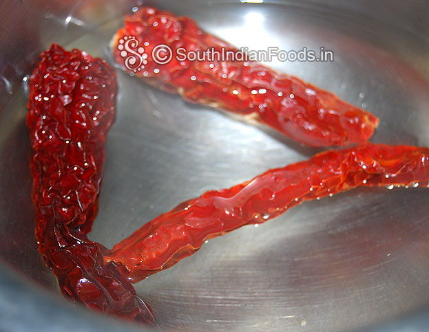 Soak kashmiri red chilli in warm water for 5 min then drain and finely grind