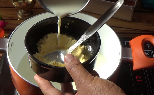 In a bowl add custard powder, milk
