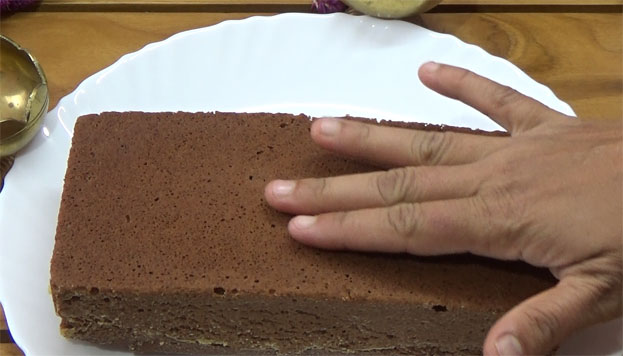 Spongy textured eggless sugarless chocolate cake ready