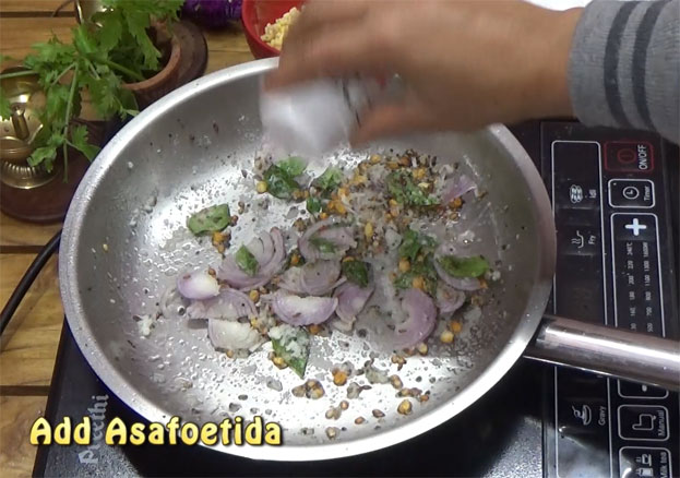 Add asafoetida, onion, curry leaves